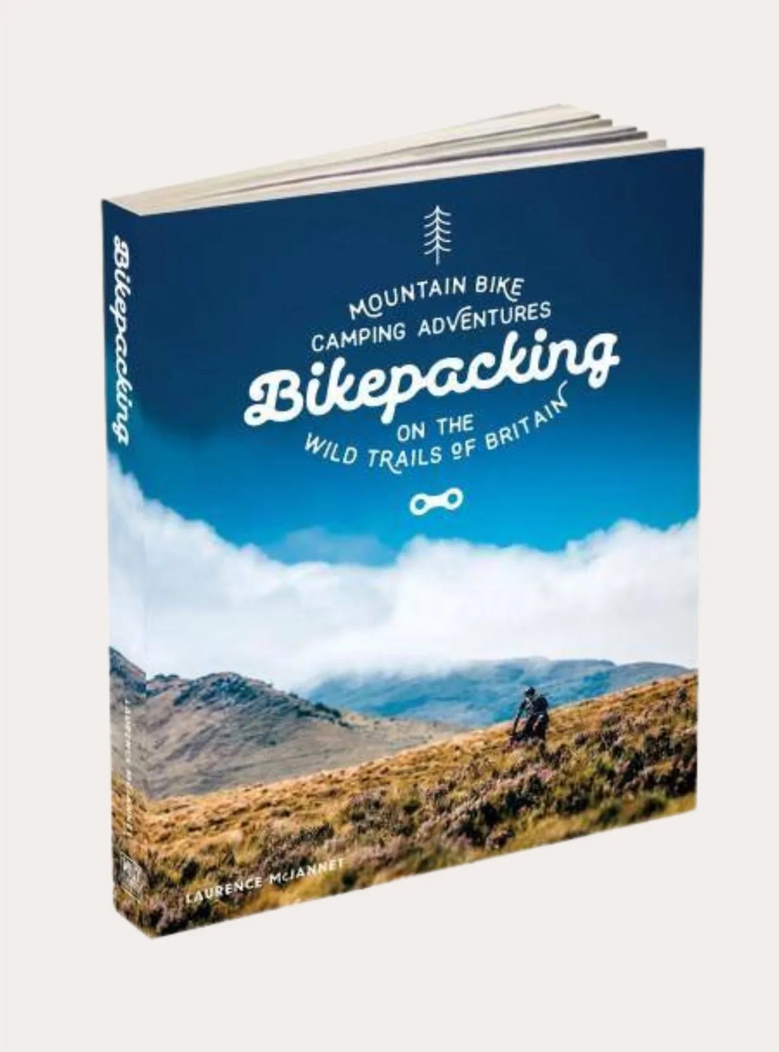Book titled Bikepacking with mountain bike camping adventures on Britain's wild trails featuring scenic hills and cyclist