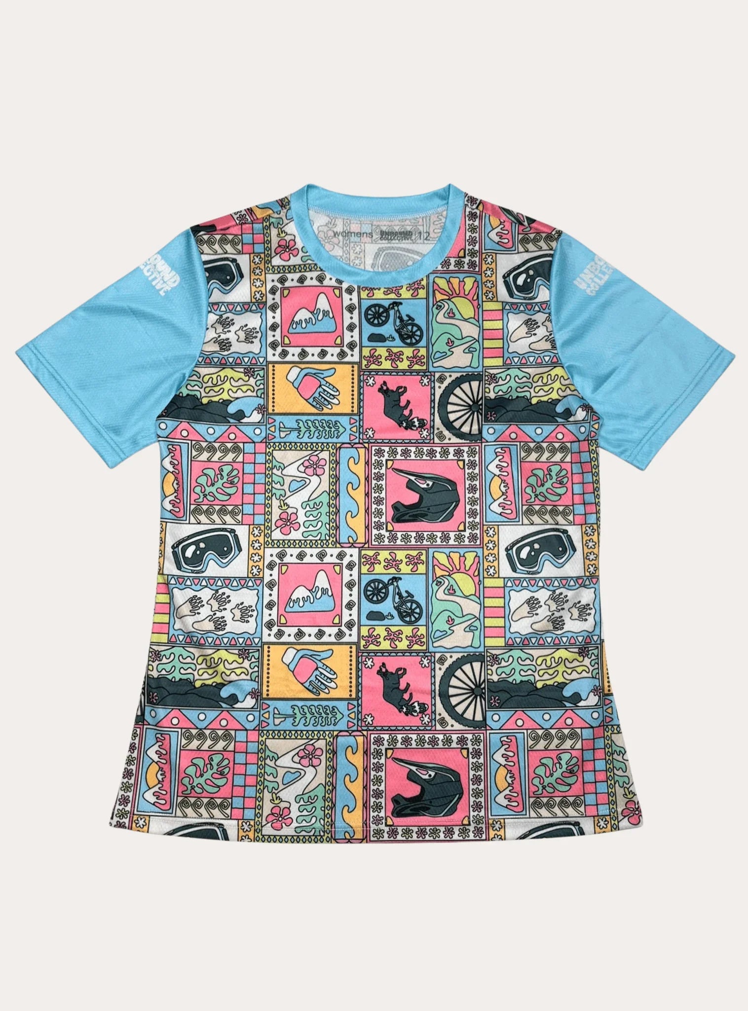 Women's short sleeve mountain bike jersey with colorful patchwork design featuring helmets, bikes, gloves, and nature motifs