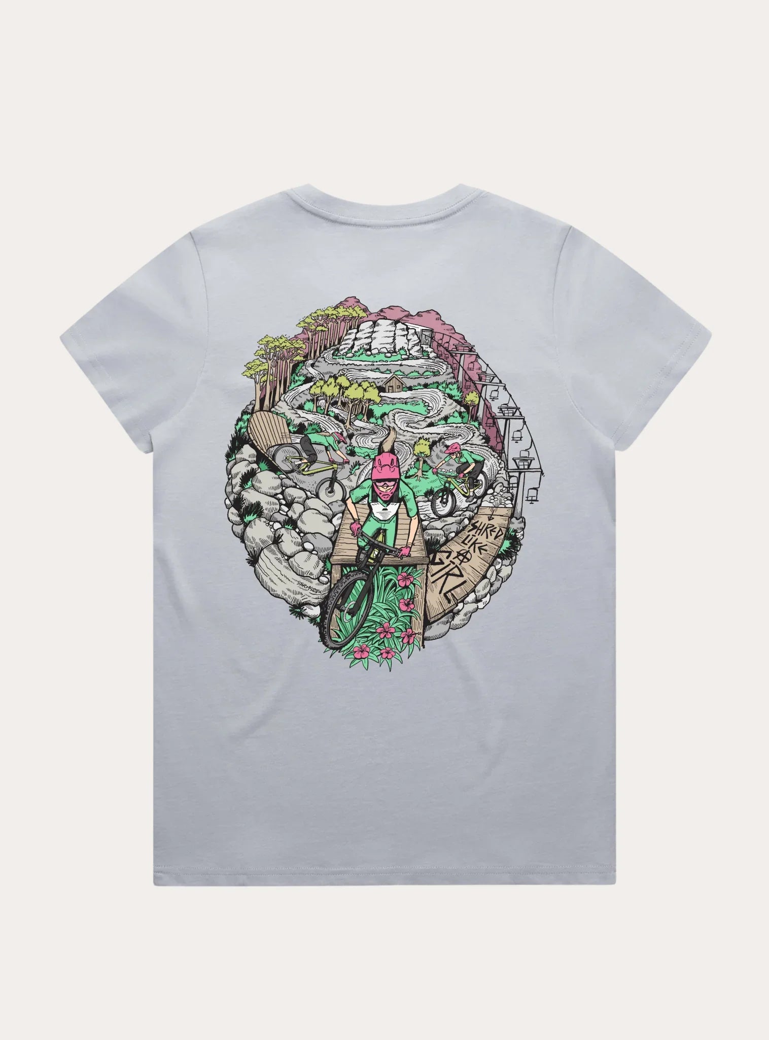 Light gray women's tee with colorful mountain bike trail and riders graphic, featuring forest, rocks, and 'Shred Like a Girl' sign