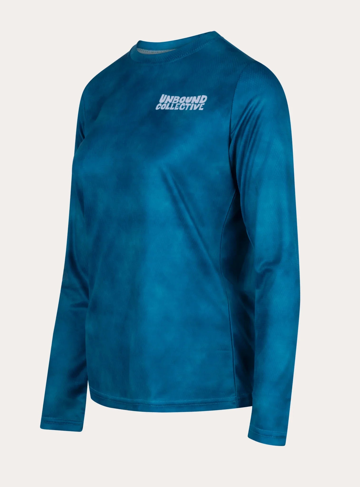 Blue long sleeve women's mountain bike jersey with Unbound Collective logo on chest