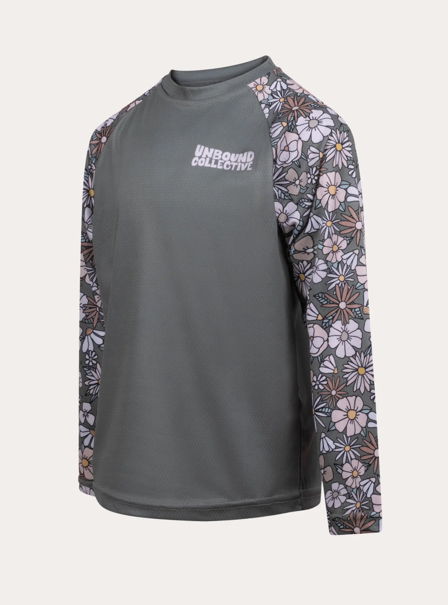 Youth mountain bike jersey with retro floral pattern sleeves and Unbound Collective logo on gray body