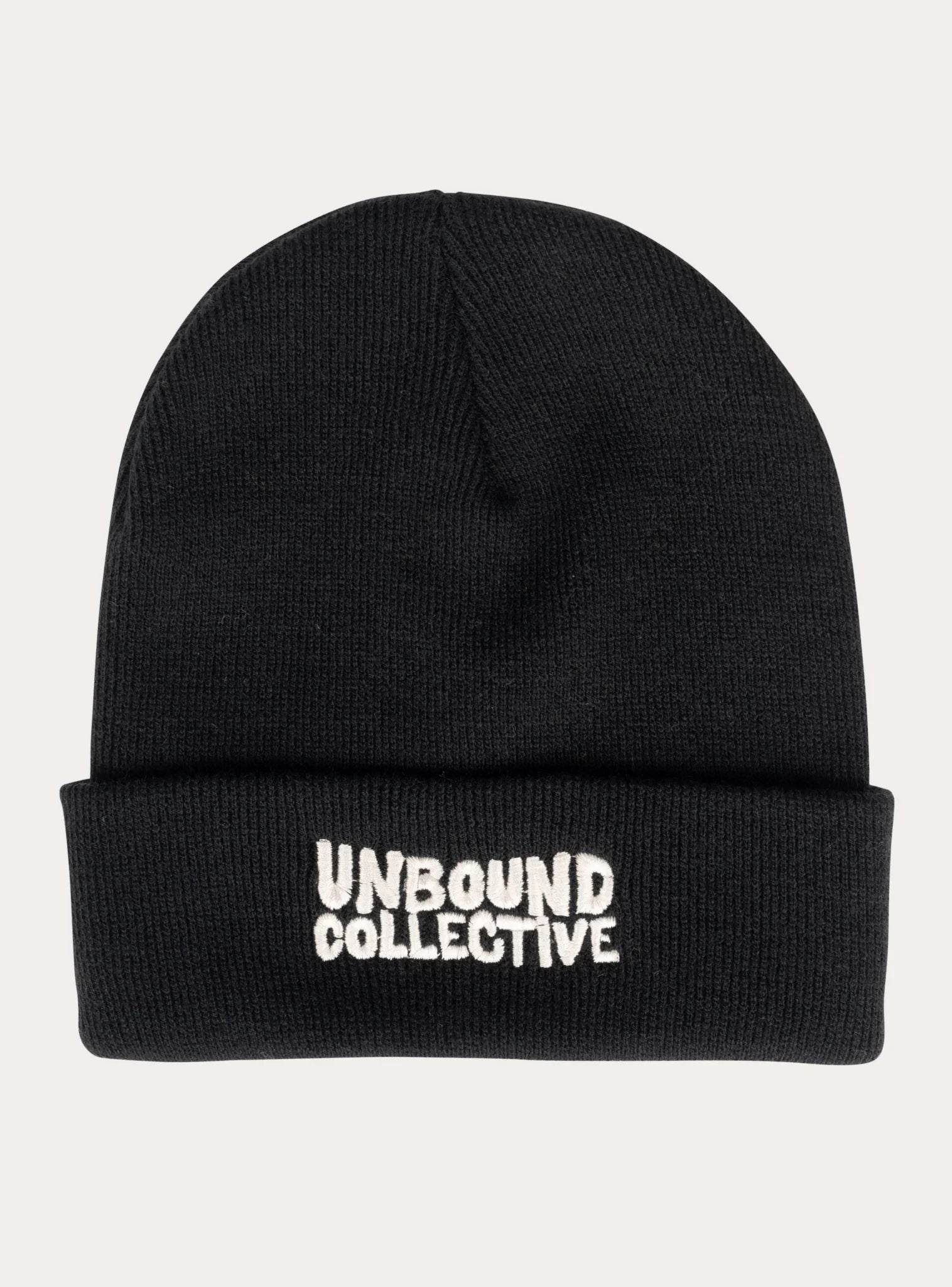 Black knitted beanie hat with white embroidered Unbound Collective logo, sustainable mountain bike apparel