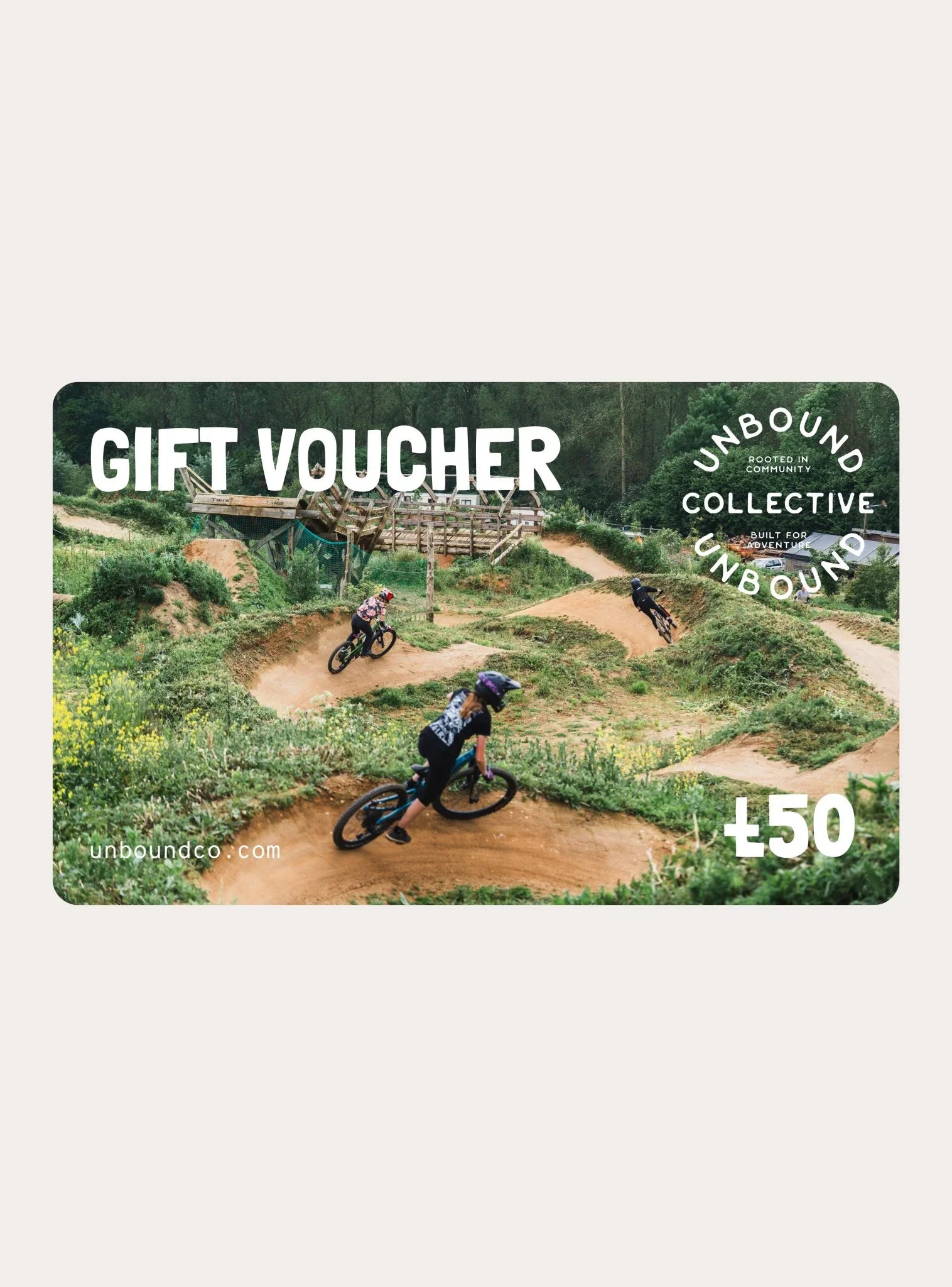 Unbound Collective £50 gift voucher featuring mountain bikers on a dirt trail with greenery and wooden ramp