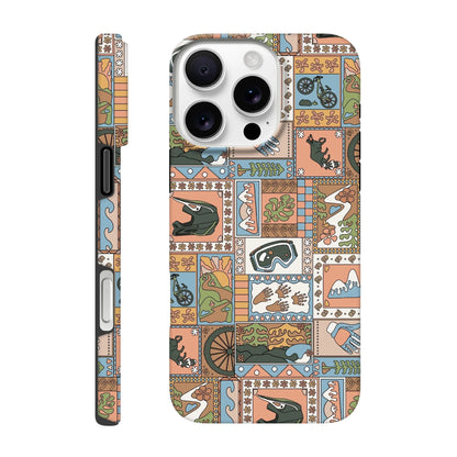 iPhone case with colorful mountain biking patchwork design featuring helmet, goggles, bike, trail, and nature icons