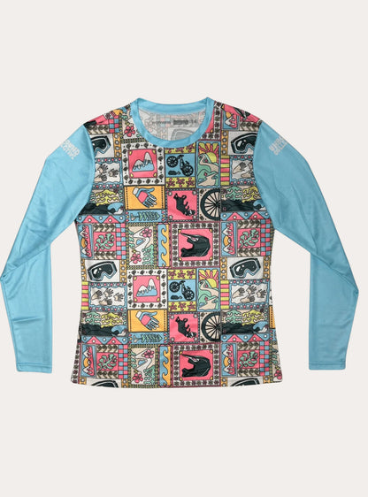 Women's long sleeve MTB jersey with colorful mountain biking themed patchwork design and light blue sleeves
