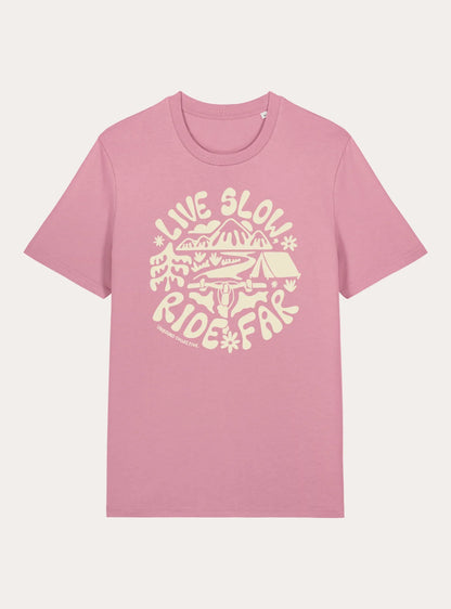 Pink unisex tee with white graphic mountain bike design and text 'Live Slow Ride Far' from Unbound Collective